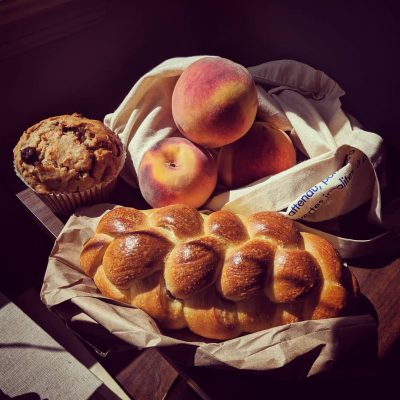 This is my haul from a summer trip to the Blacksburg Farmer's Market: a muffin, challah bread, and peaches.