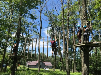 Graduate student Brad Gibbons on the Ropes Course at Mountain Lake Lodge