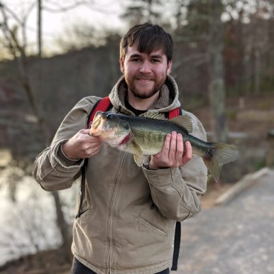 Picture of Jacob Murray and his personal best Bass caught from the local pond.
