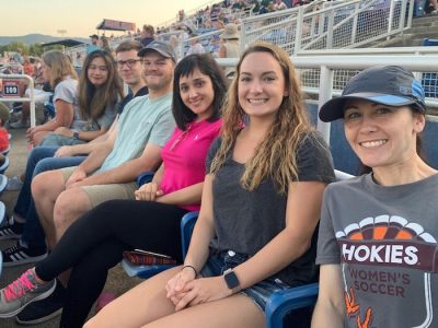 Picture of chemistry graduate students in the Moore Research Group at a Salem Red Sox minor league baseball game.